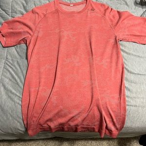 Lululemon metal vent T-shirt. Lightly worn no damages. Pinkish camo design